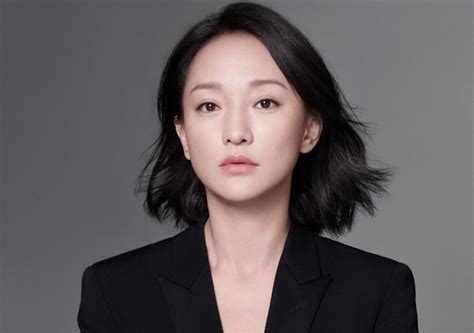 Exploring Zhou Xun's Financial Success