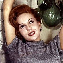 The Allure and Grace of Colleen Farrington's Stage Presence